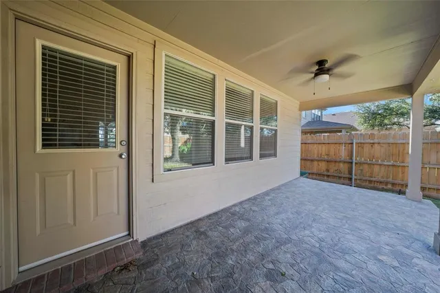 a view of backyard with porch