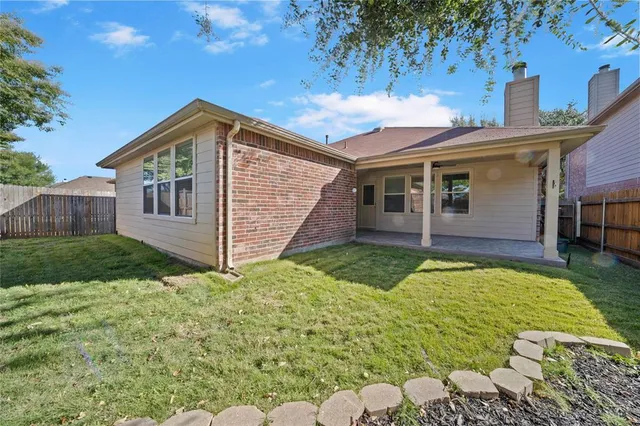 a view of backyard of house