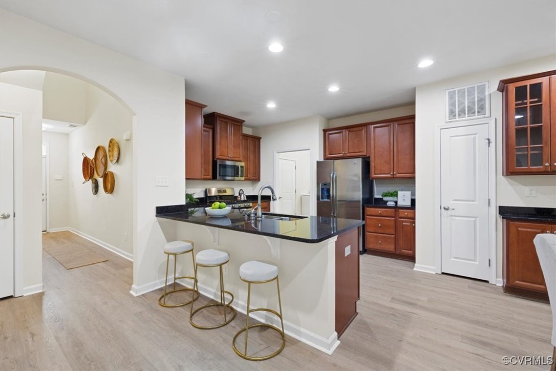 5801 Riverside Trail Richmond, VA 23225 - Photo 12 of 35 Kitchen featuring stainless steel appliances, a si