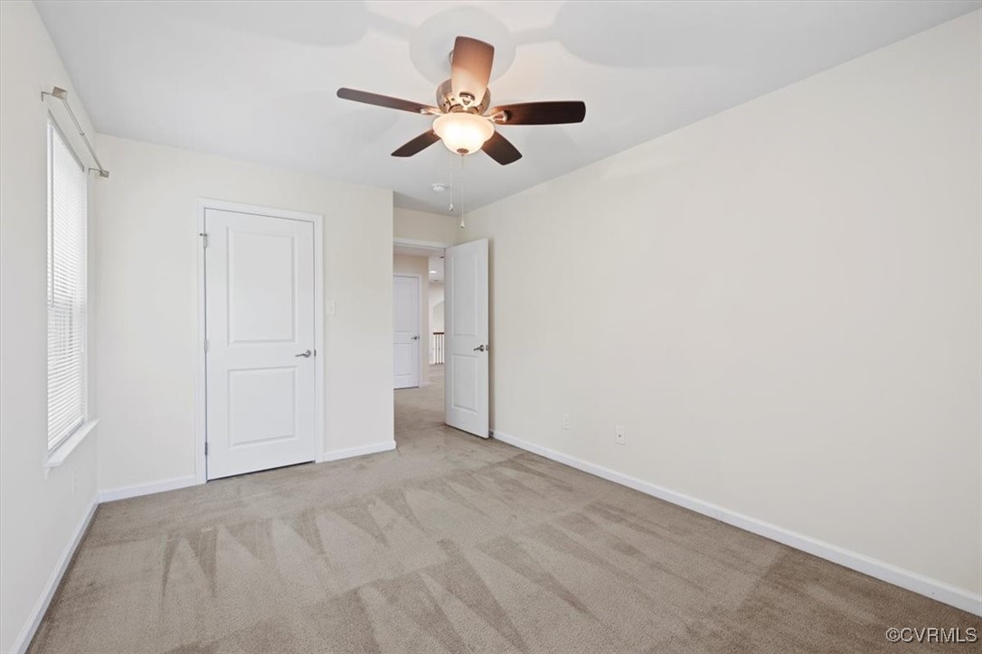 5801 Riverside Trail Richmond, VA 23225 - Photo 26 of 35 Unfurnished bedroom with carpet floors, baseboards
