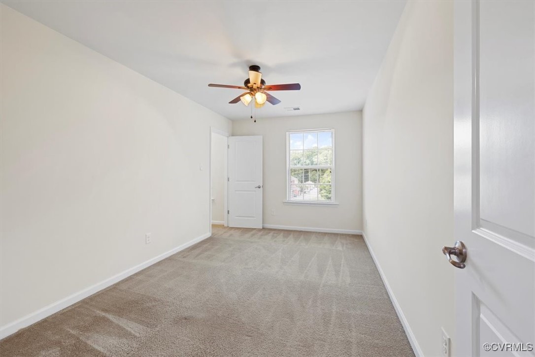 5801 Riverside Trail Richmond, VA 23225 - Photo 30 of 35 Unfurnished room with carpet floors, ceiling fan,