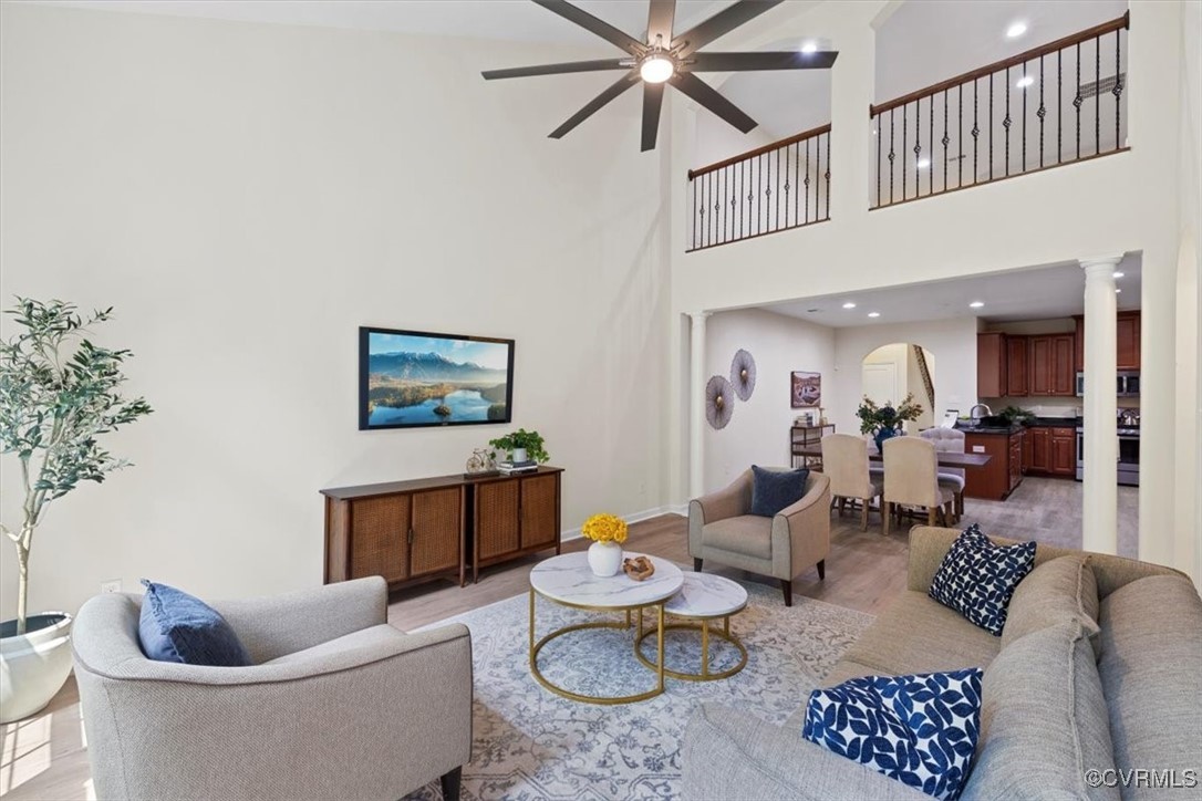 5801 Riverside Trail Richmond, VA 23225 - Photo 6 of 35 Living room featuring decorative columns, a ceilin