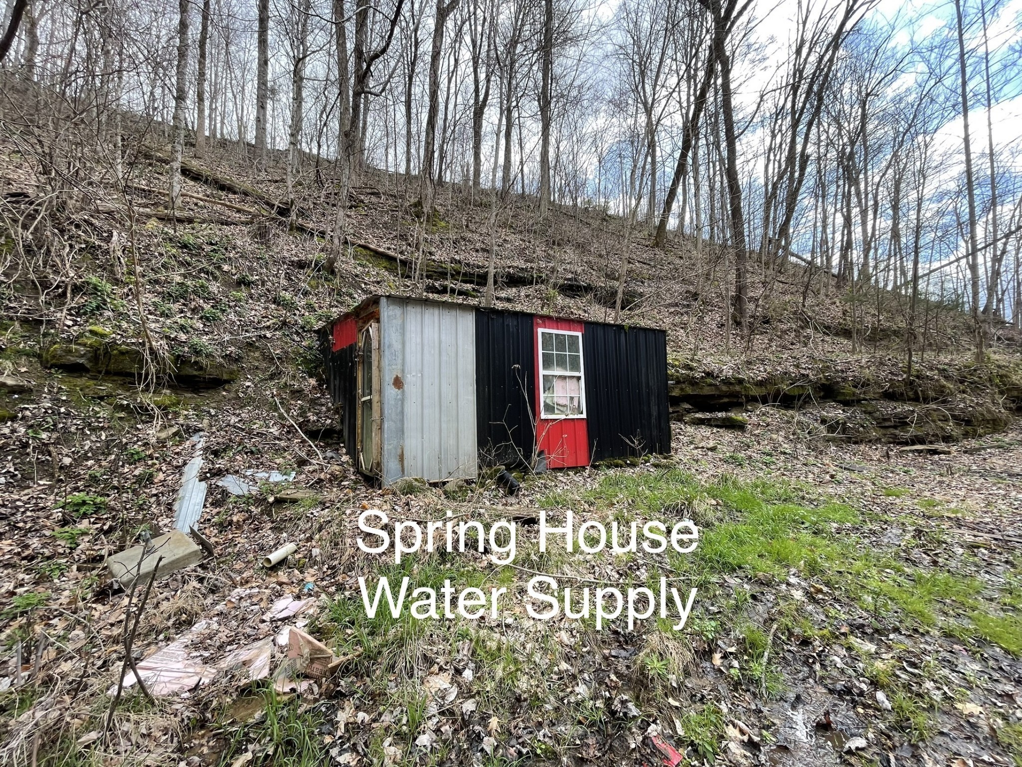 250 Possum Hollow Road Dowelltown, TN 37059 - Photo 12 of 31 a view of a sign board with wooden fence