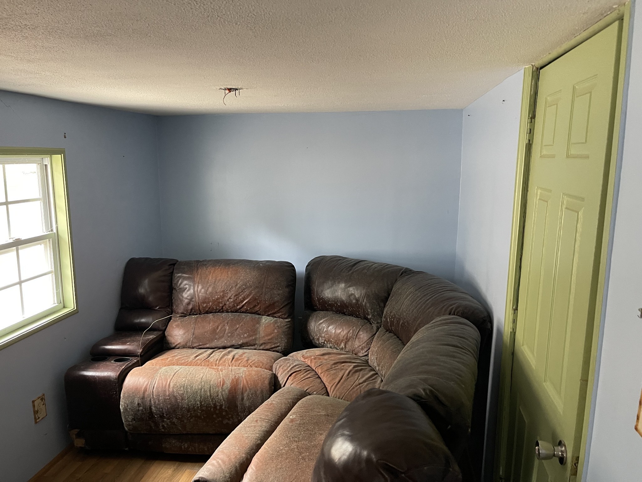 250 Possum Hollow Road Dowelltown, TN 37059 - Photo 23 of 31 a living room with furniture and a couch