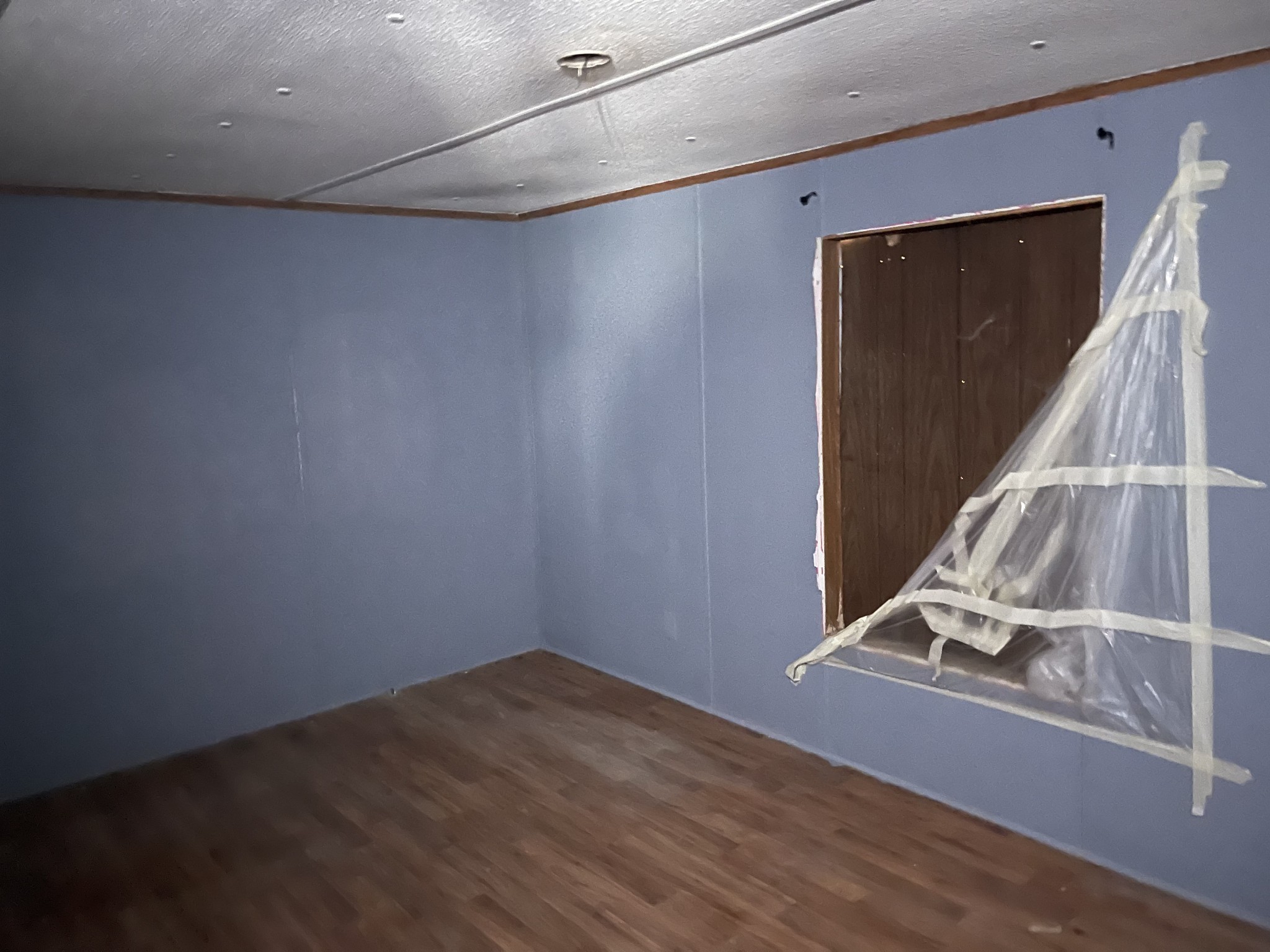 250 Possum Hollow Road Dowelltown, TN 37059 - Photo 27 of 31 a view of a room with wooden floor