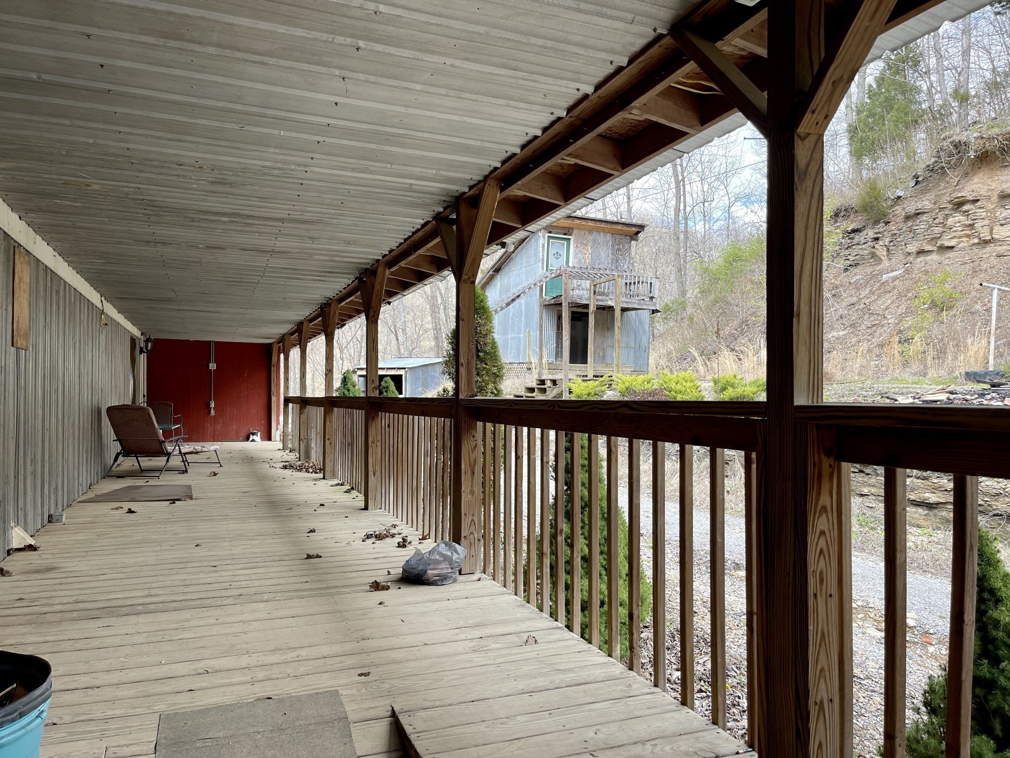 250 Possum Hollow Road Dowelltown, TN 37059 - Photo 5 of 31 a view of a balcony with chairs
