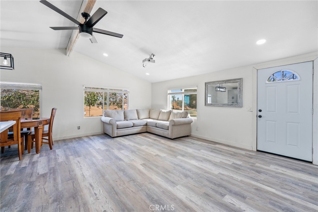 11772-11772 Middleton Road Phelan, CA 92371 - Photo 13 of 40 a living room with furniture and a wooden floor