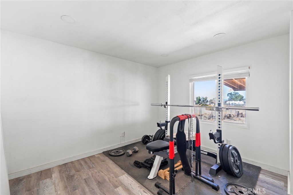 11772-11772 Middleton Road Phelan, CA 92371 - Photo 18 of 40 a view of a room with gym equipment