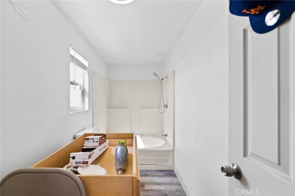 11772-11772 Middleton Road Phelan, CA 92371 - Photo 21 of 40 a living room with furniture and a wooden floor