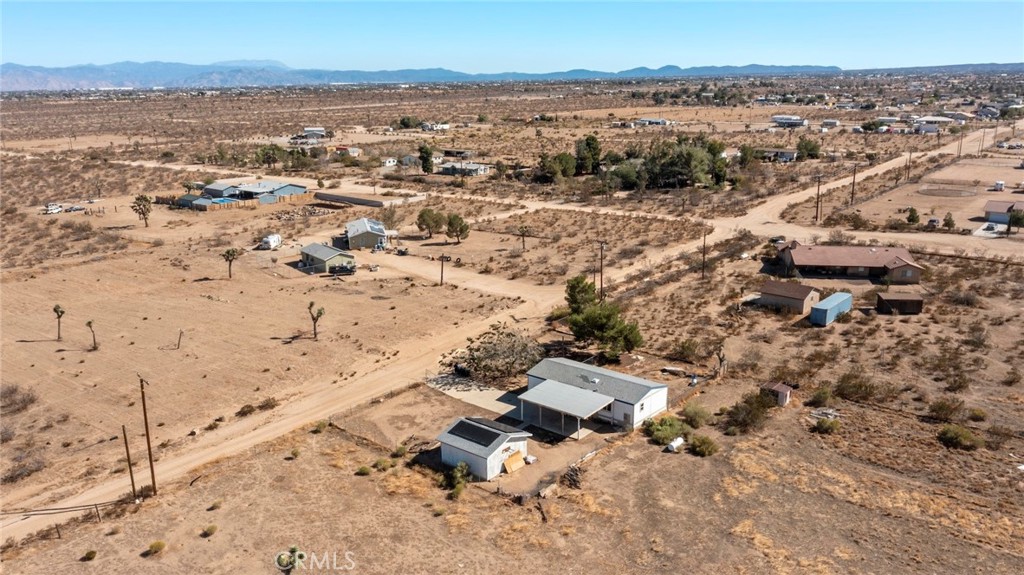 11772-11772 Middleton Road Phelan, CA 92371 - Photo 29 of 40 an aerial view of house with yard