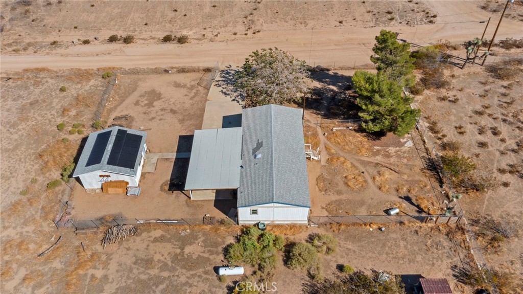 11772-11772 Middleton Road Phelan, CA 92371 - Photo 30 of 40 an aerial view of residential houses with outdoor space