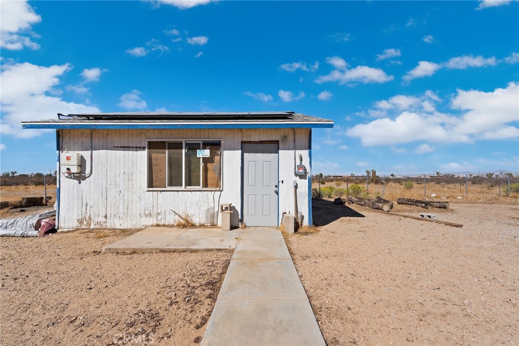 11772-11772 Middleton Road Phelan, CA 92371 - Photo 40 of 40 a view of a house with a outdoor space