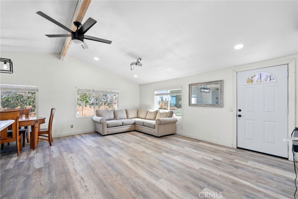 11772-11772 Middleton Road Phelan, CA 92371 - Photo 8 of 40 a living room with furniture and wooden floor