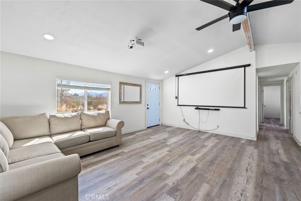 11772-11772 Middleton Road Phelan, CA 92371 - Photo 9 of 40 a living room with furniture and a window