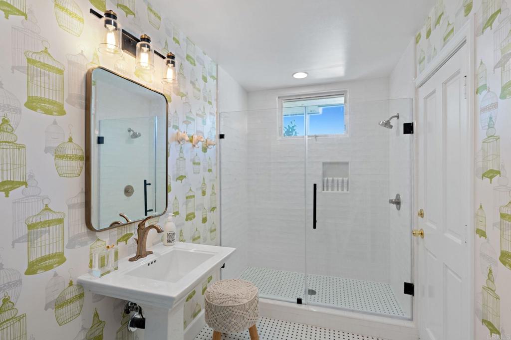 18 Gateview Drive Fallbrook, CA 92028 - Photo 17 of 73 a bathroom with a sink toilet and shower