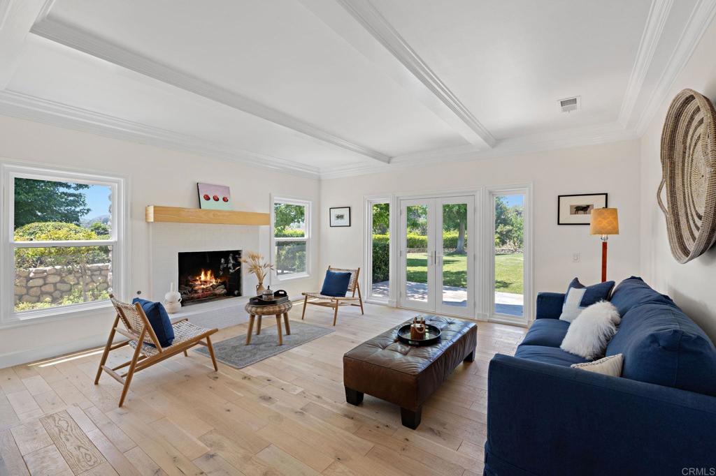 18 Gateview Drive Fallbrook, CA 92028 - Photo 2 of 73 a living room with furniture and a fireplace