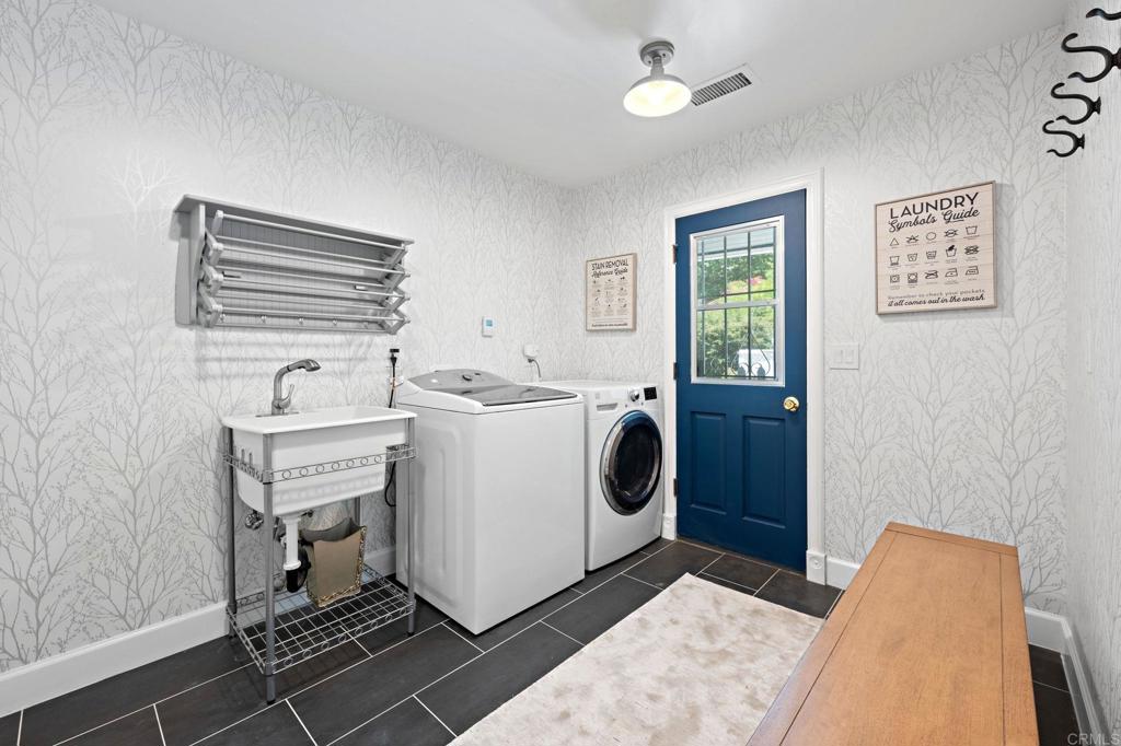 18 Gateview Drive Fallbrook, CA 92028 - Photo 26 of 73 a utility room with dryer and washer