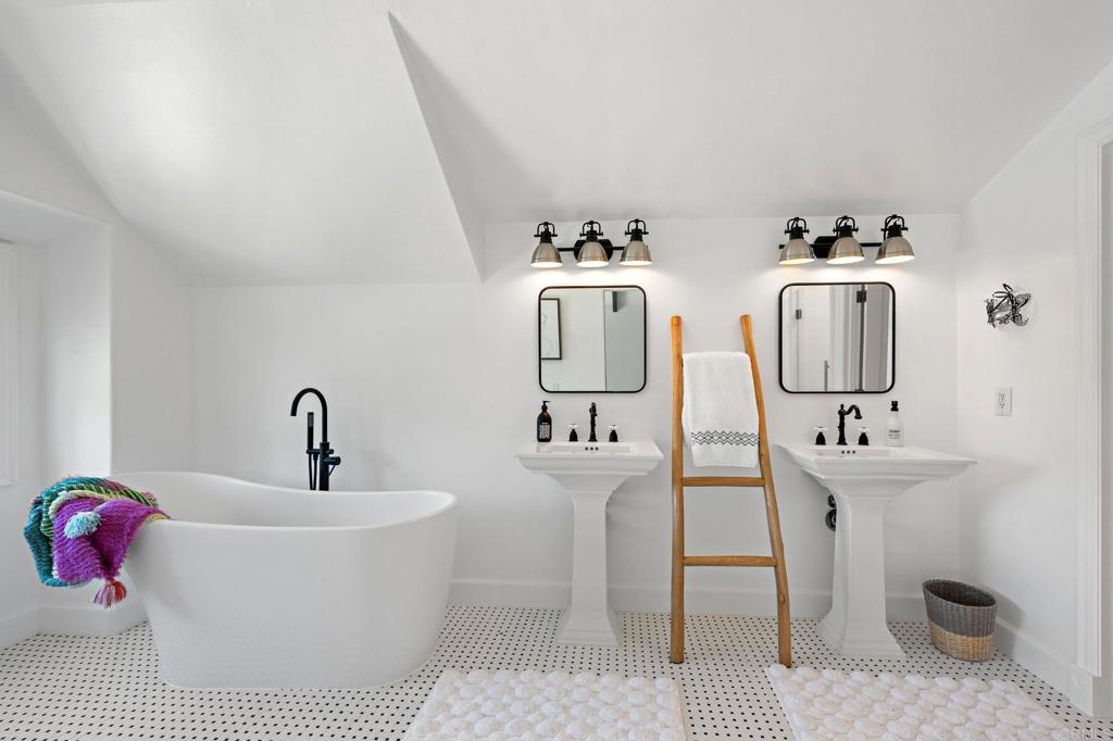 18 Gateview Drive Fallbrook, CA 92028 - Photo 34 of 73 a white bath tub sitting next to a bathroom sink