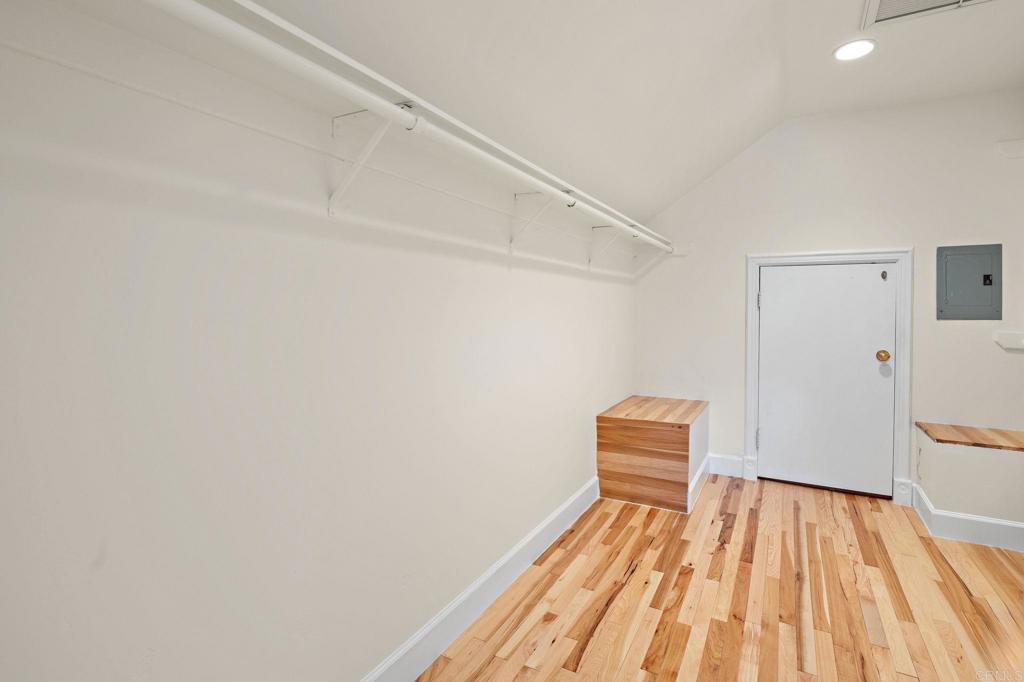 18 Gateview Drive Fallbrook, CA 92028 - Photo 37 of 73 a bedroom with a bed and a wooden floor