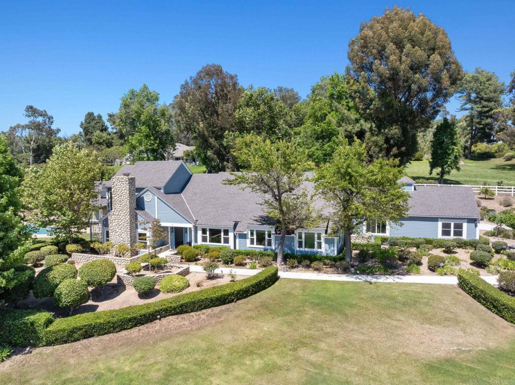 18 Gateview Drive Fallbrook, CA 92028 - Photo 57 of 73 a front view of a house with a yard table and chairs