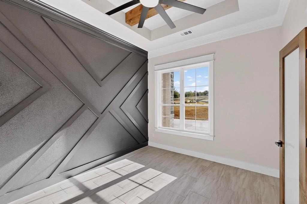 1161 Gonzollas Road Springtown, TX 76082 - Photo 6 of 40 a view of an empty room with a window