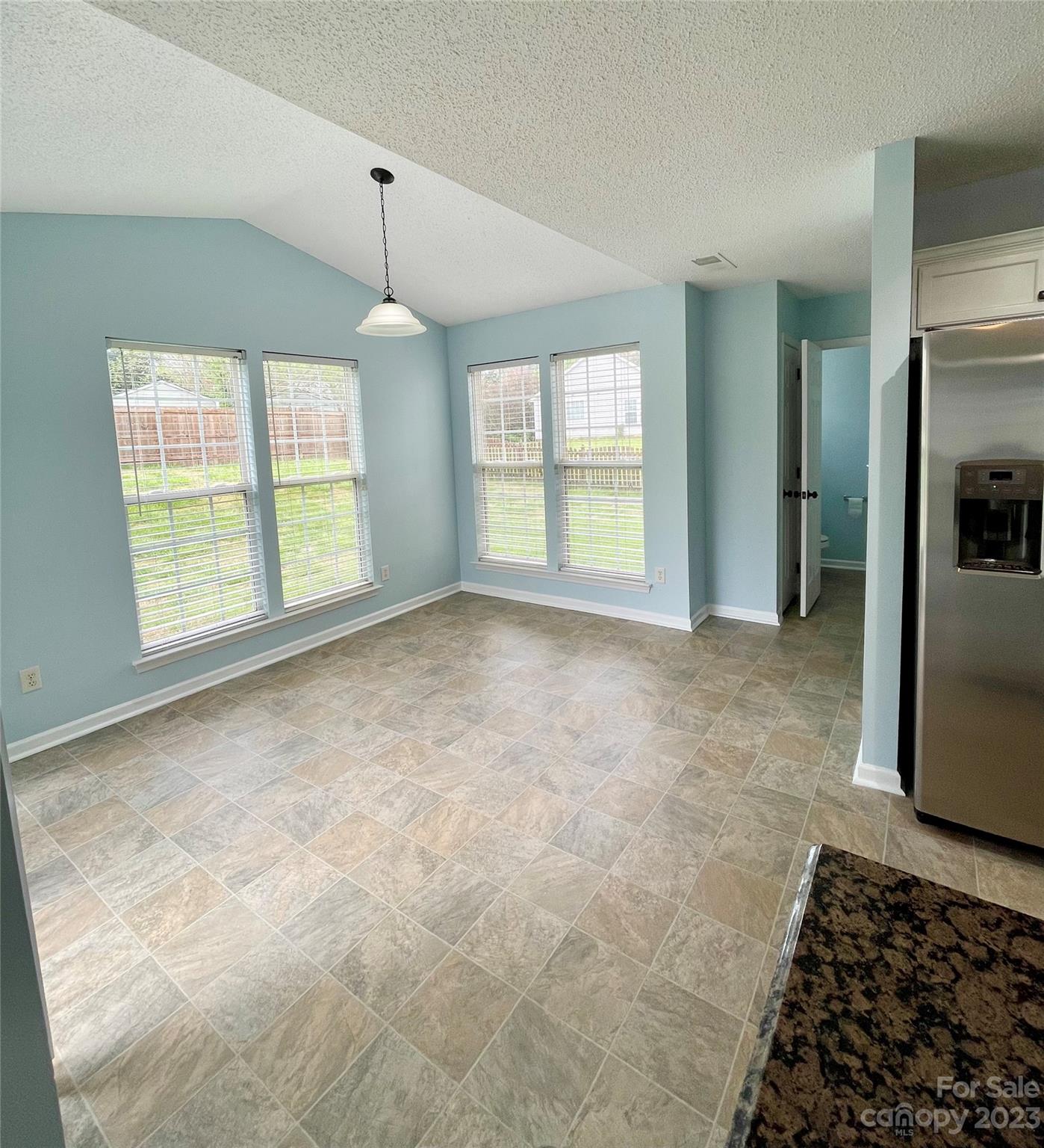 4045 Suttle Place Matthews, NC 28104 - Photo 17 of 42 a view of an empty room with a window