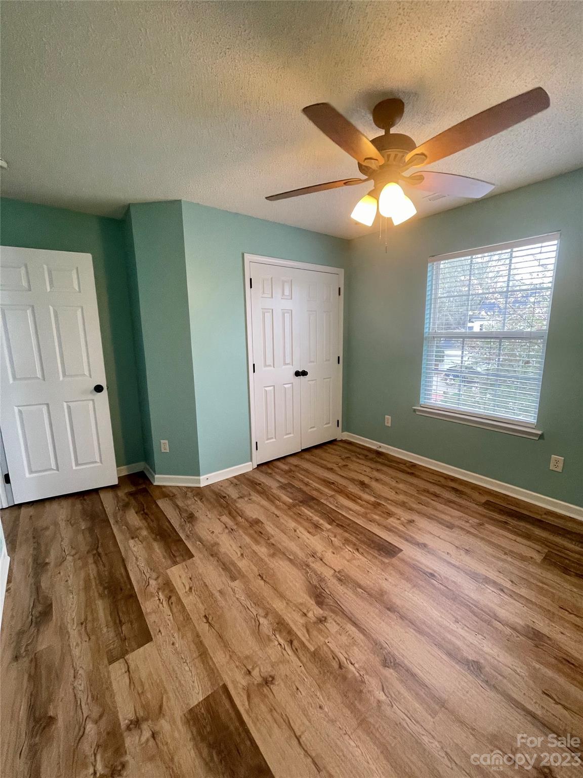 4045 Suttle Place Matthews, NC 28104 - Photo 25 of 42 a view of empty room with window and ceiling fan
