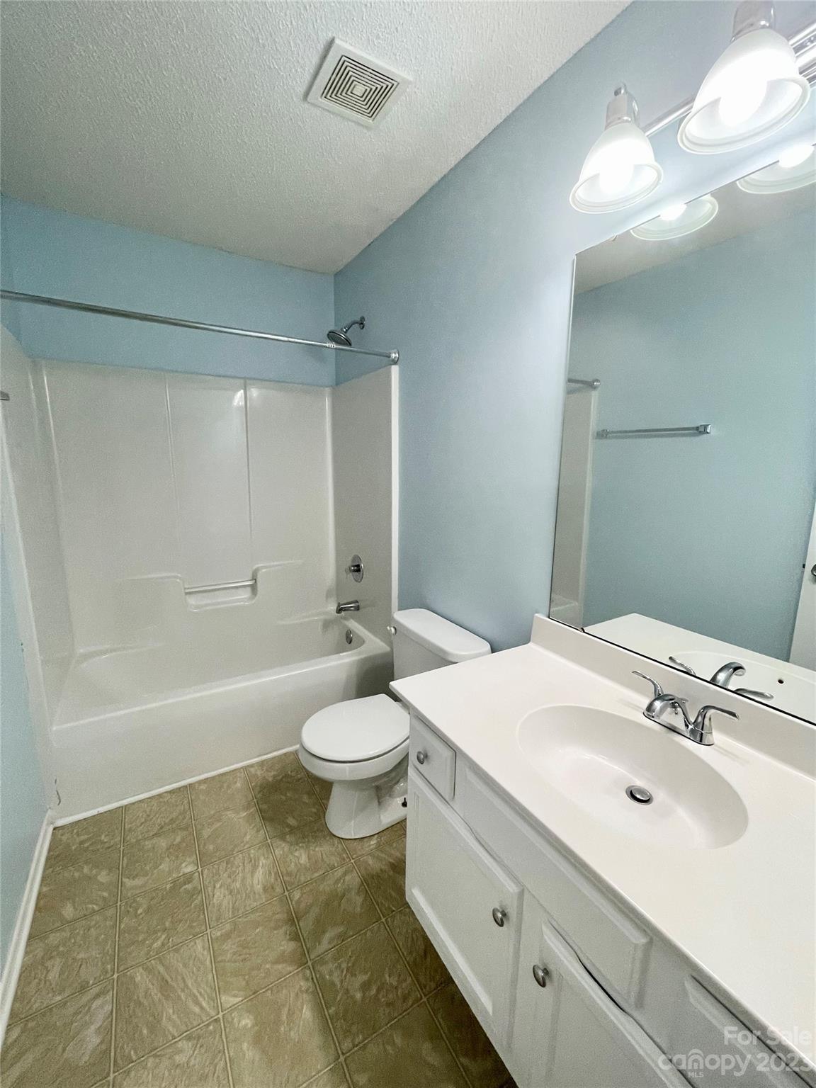 4045 Suttle Place Matthews, NC 28104 - Photo 30 of 42 a bathroom with a sink a toilet and shower