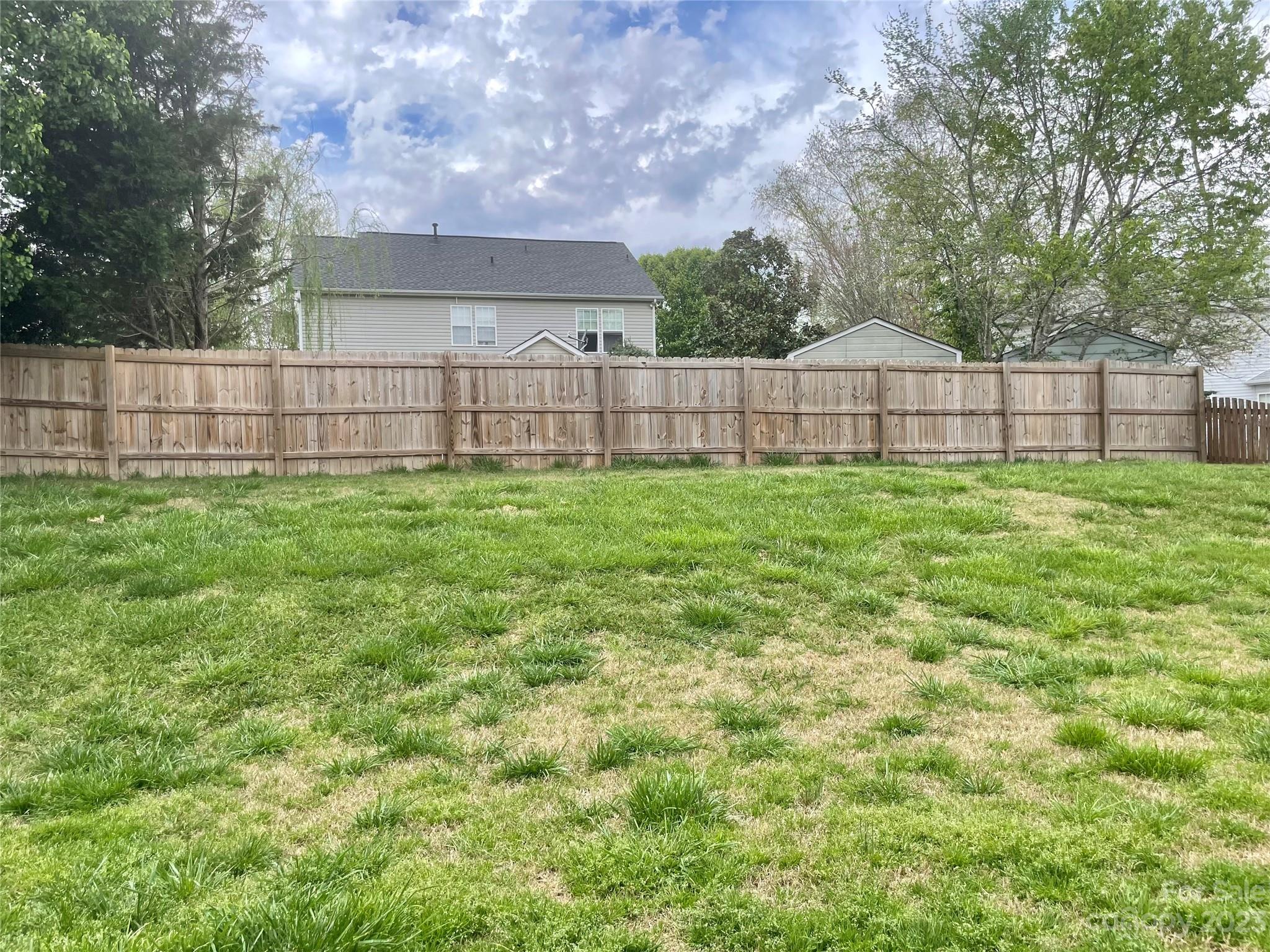 4045 Suttle Place Matthews, NC 28104 - Photo 37 of 42 a view of a backyard with green space