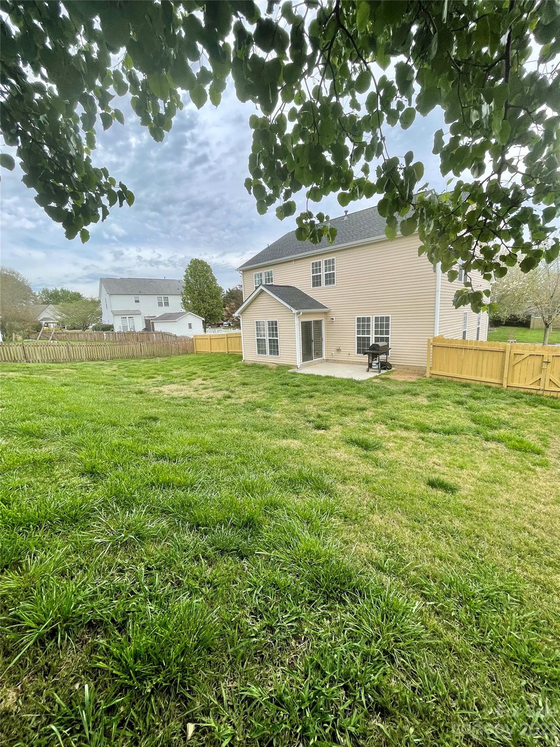 4045 Suttle Place Matthews, NC 28104 - Photo 40 of 42 a house view with a garden space