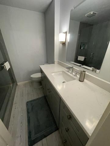 806 West 24th Street, Unit 116 Austin, TX 78705 - Photo 7 of 9 a bathroom with a sink and mirror