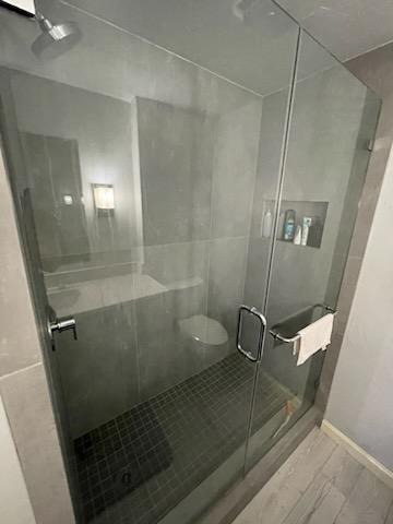 806 West 24th Street, Unit 116 Austin, TX 78705 - Photo 8 of 9 a bathroom with a shower