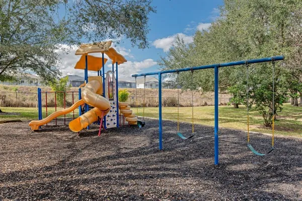 a view of a park with slide