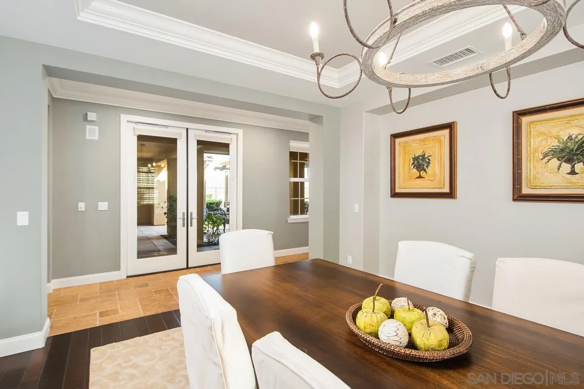 6941 Sitio Cordero Carlsbad, CA 92009 - Photo 12 of 44 a living room with furniture and a table