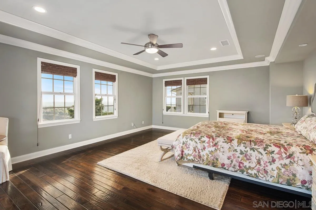 6941 Sitio Cordero Carlsbad, CA 92009 - Photo 15 of 44 a bedroom with bed and window