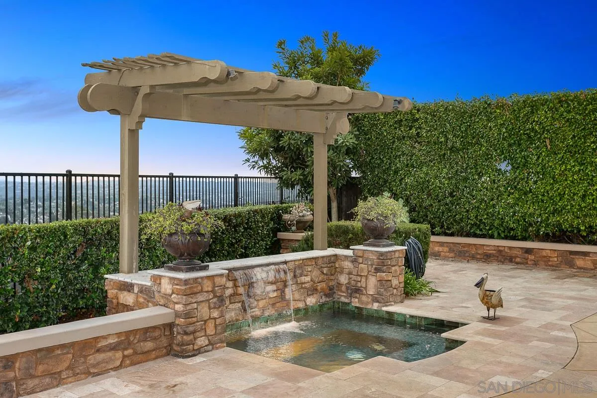 6941 Sitio Cordero Carlsbad, CA 92009 - Photo 37 of 44 a view of a fountain in the terrace