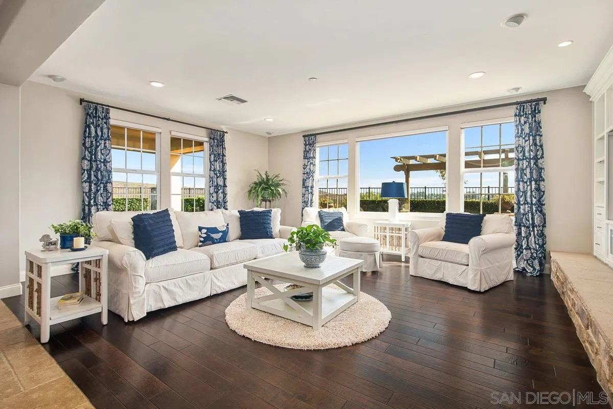 6941 Sitio Cordero Carlsbad, CA 92009 - Photo 4 of 44 a living room with furniture and a large window