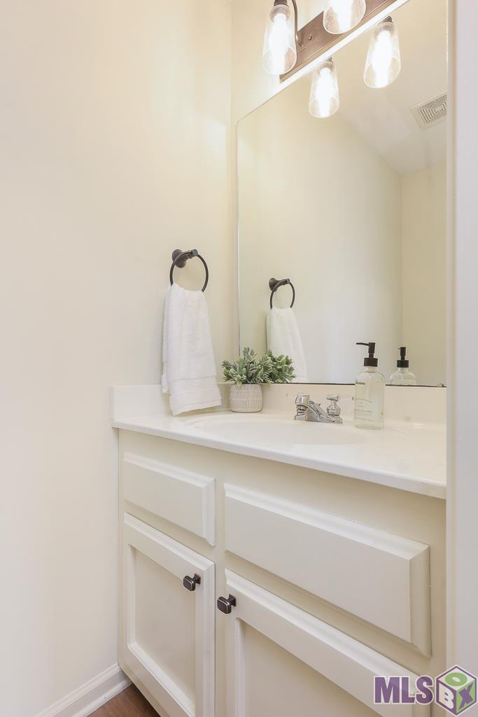 1661 Sharp Road Baton Rouge, LA 70815 - Photo 22 of 29 Down stairs half bathroom
