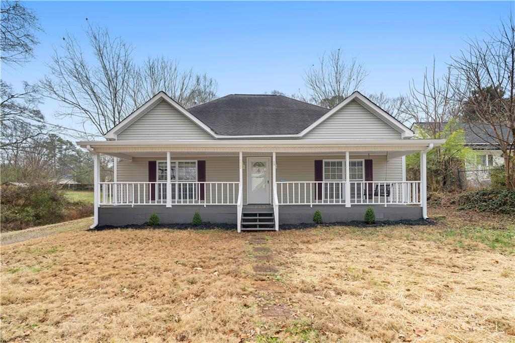 front view of a house with a yard