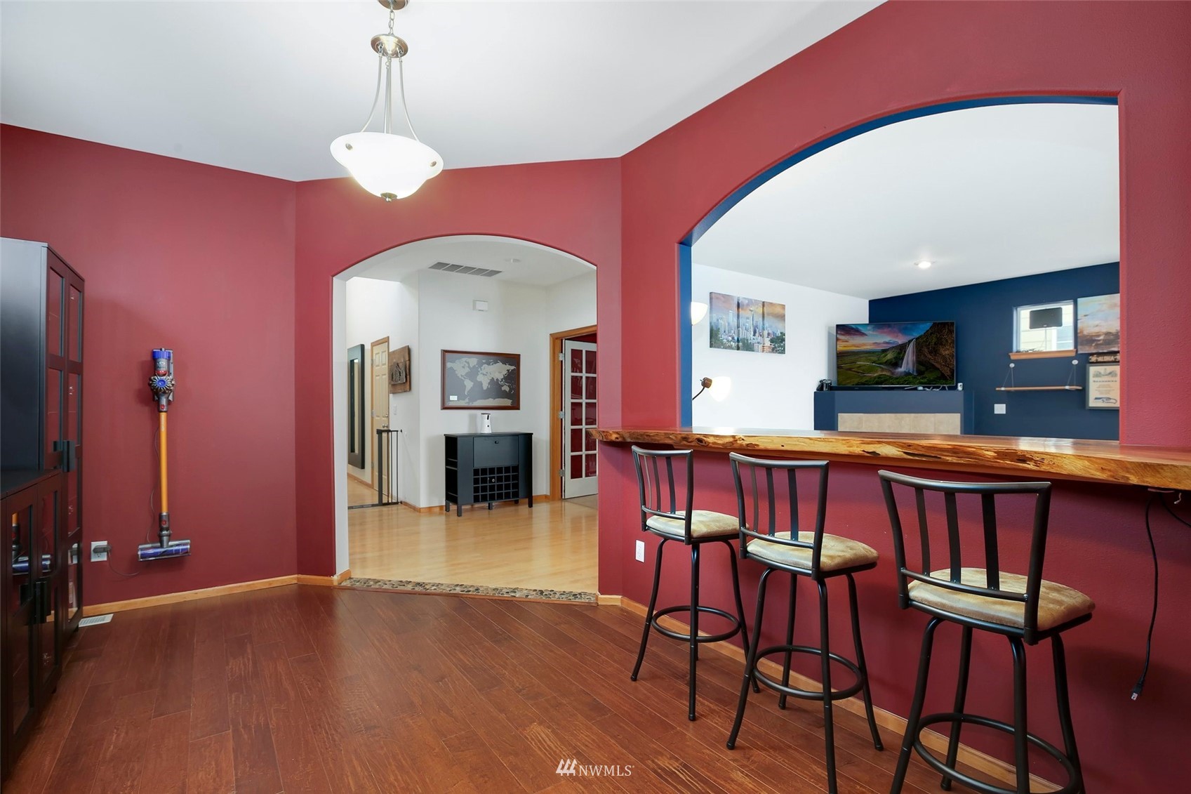 4127 Northeast 5th Court Renton, WA 98059 - Photo 21 of 36 a view of a dining room with furniture and chandelier
