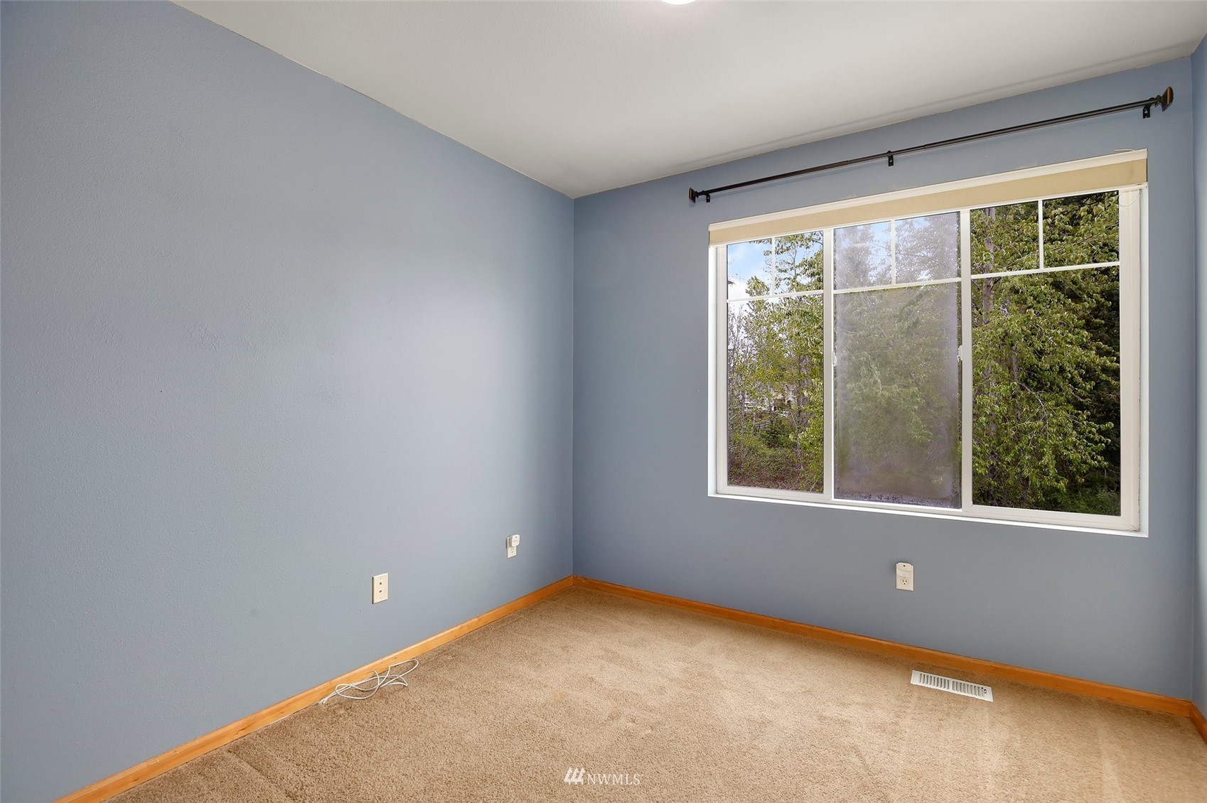 4127 Northeast 5th Court Renton, WA 98059 - Photo 30 of 36 an empty room with a window