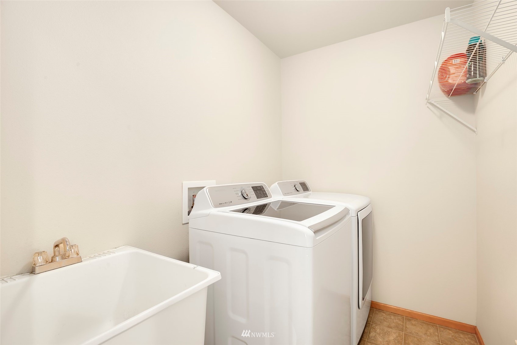 4127 Northeast 5th Court Renton, WA 98059 - Photo 32 of 36 a utility room with dryer and washer