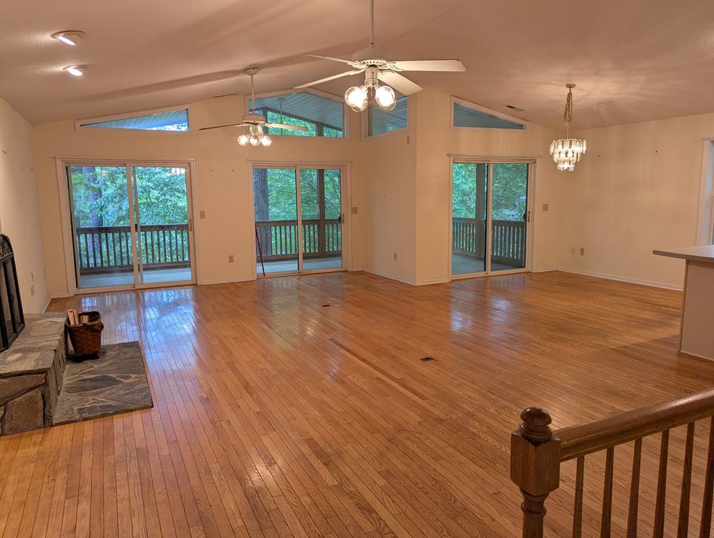283 Deaver Cove Road Blairsville, GA 30512 - Photo 2 of 27 Main Level Living/Dining/Kitchen, Open main level with full deck overlooking the wooded lot. Partial winter water view