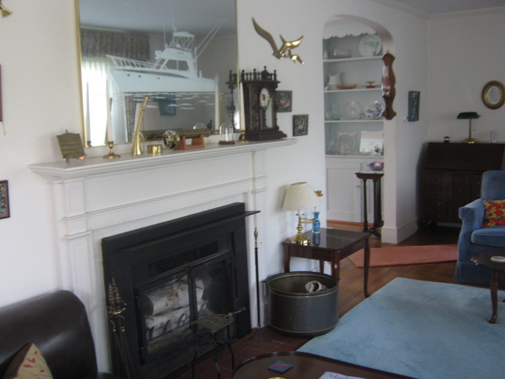 4 Old Salem Road Marblehead, MA 01945 - Photo 3 of 12 a living room with furniture and a fireplace
