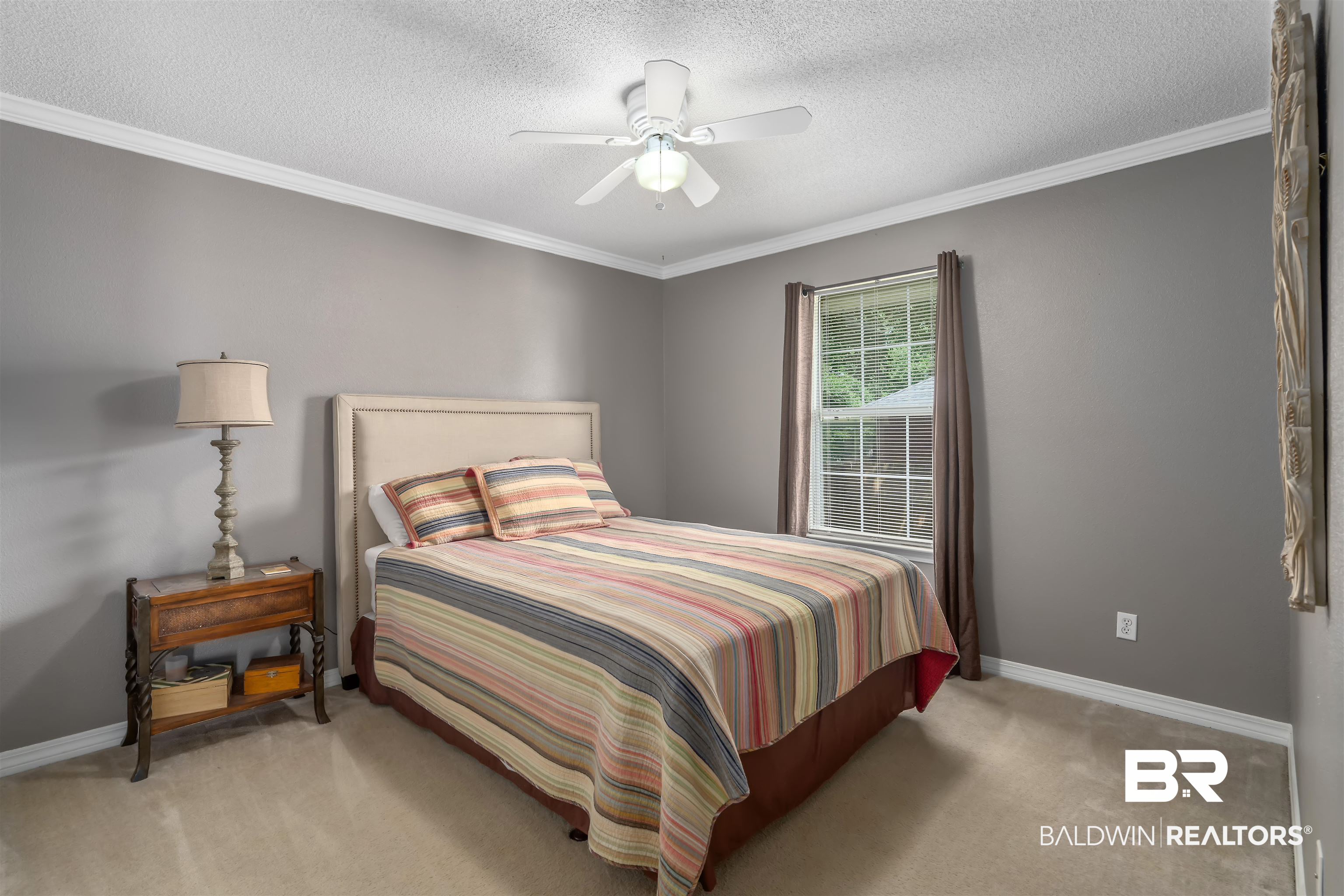 11097 Pontchartrain Loop Daphne, AL 36526 - Photo 22 of 28 Bedroom with light carpet, ornamental molding, a textured ceiling, and ceiling fan
