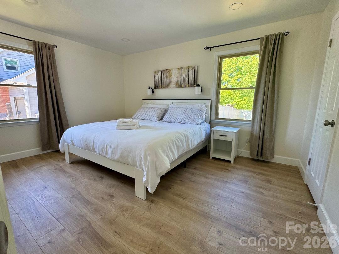 168 Mooreland Road Mooresville, NC 28117 - Photo 15 of 32 a bedroom with a bed and a window