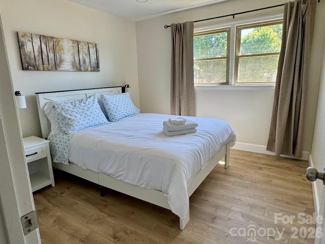 168 Mooreland Road Mooresville, NC 28117 - Photo 17 of 32 a bedroom with a bed and a window