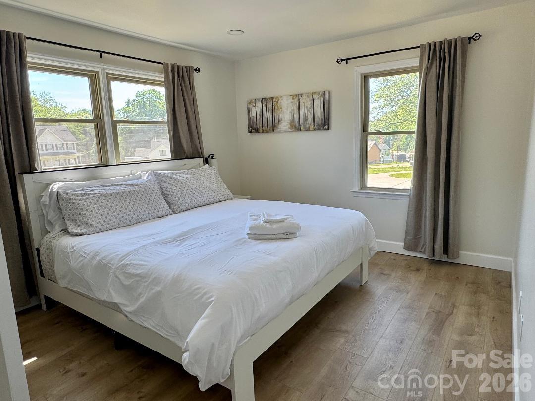 168 Mooreland Road Mooresville, NC 28117 - Photo 18 of 32 a bedroom with a bed and window