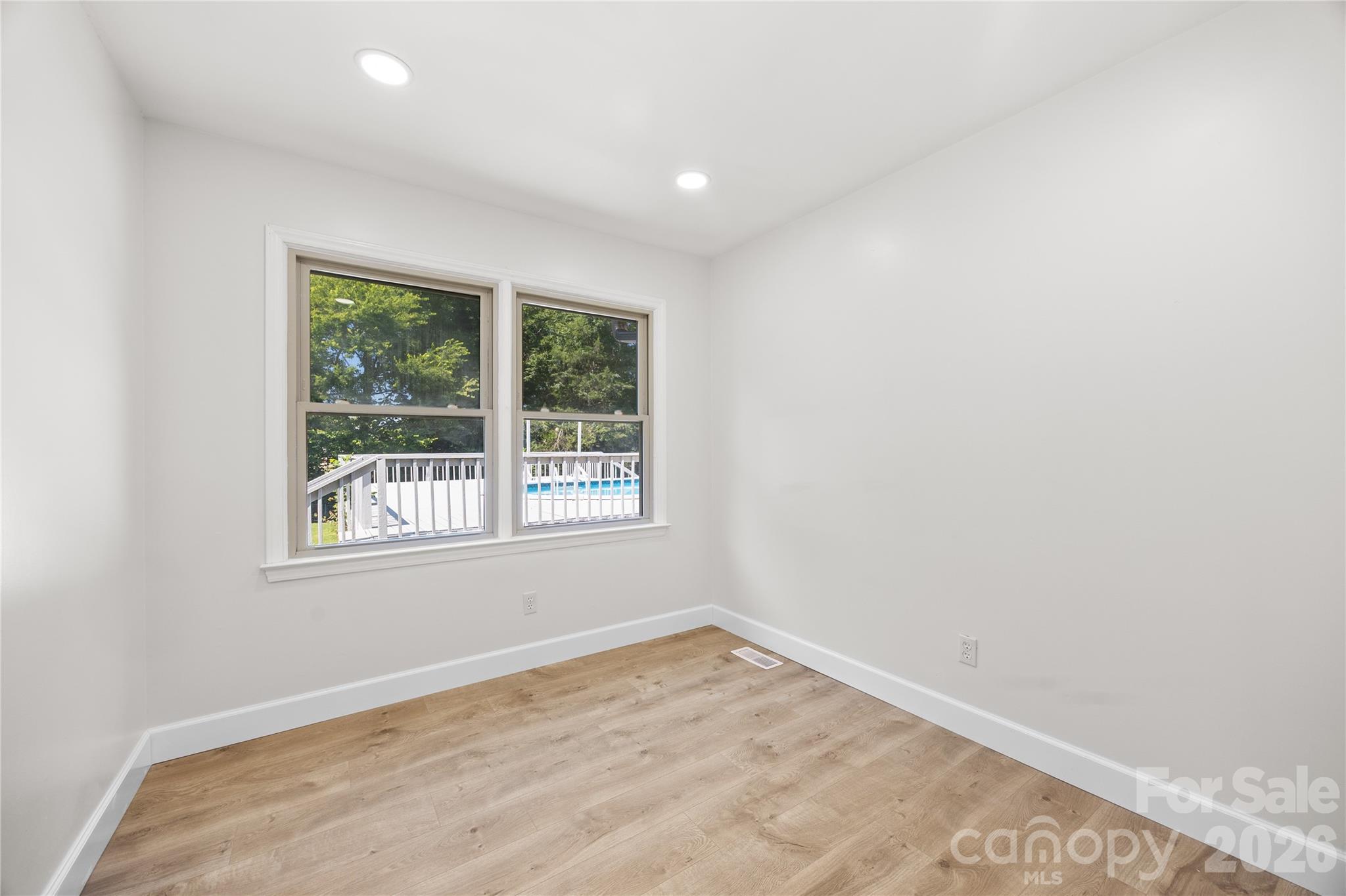 168 Mooreland Road Mooresville, NC 28117 - Photo 19 of 32 an empty room with a window