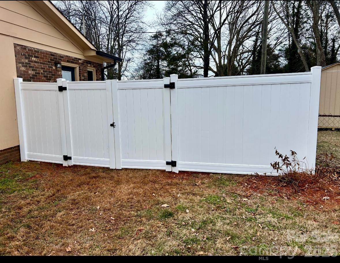 168 Mooreland Road Mooresville, NC 28117 - Photo 30 of 32 a view of a house with a yard